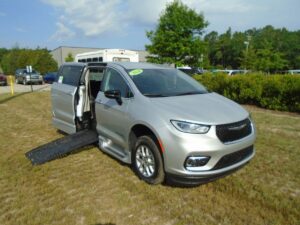 Silver Chrysler Pacifica with BraunAbility Side Entry Automatic Fold Out conversion