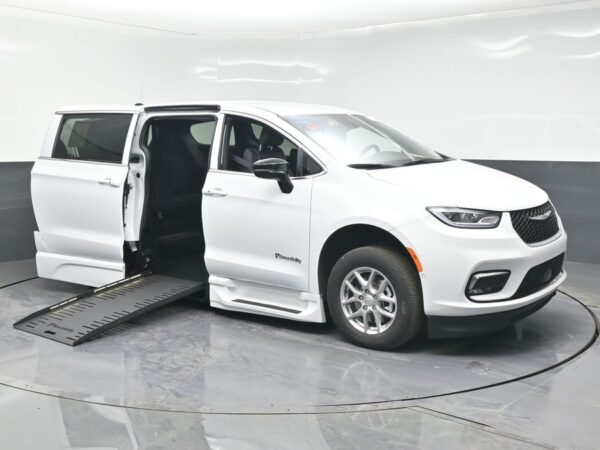 White Chrysler Pacifica with BraunAbility Side Entry Automatic Fold Out conversion