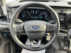 White Ford T350 with Driverge Side Entry Automatic Fold Out conversion