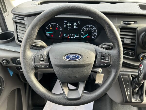 White Ford T350 with Driverge Side Entry Automatic Fold Out conversion