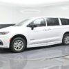 White Chrysler Pacifica with BraunAbility Side Entry Automatic Fold Out conversion