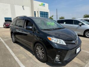 Black Toyota Sienna with Driverge Rear Entry Manual Fold Out conversion