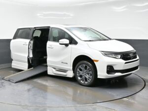 White Honda Odyssey with BraunAbility Side Entry Automatic In Floor conversion