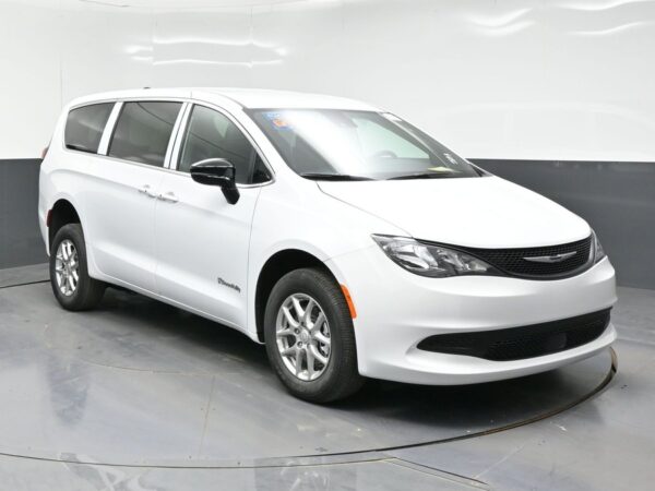 White Chrysler Voyager with BraunAbility Rear Entry Manual Fold Out conversion