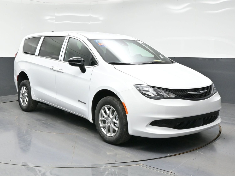 White Chrysler Voyager with BraunAbility Rear Entry Manual Fold Out conversion