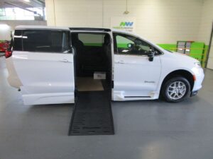 White Chrysler Pacifica with BraunAbility Side Entry Automatic Fold Out conversion