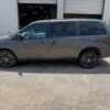 Grey Dodge Grand Caravan with Adaptive Vans Side Entry Automatic Fold Out conversion