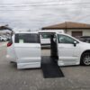 White Chrysler Voyager with BraunAbility Side Entry Automatic Fold Out conversion