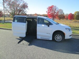 White Chrysler Voyager with BraunAbility Side Entry Automatic Fold Out conversion