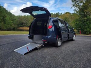 Blue Chrysler Pacifica with Driverge Rear Entry Manual Fold Out conversion