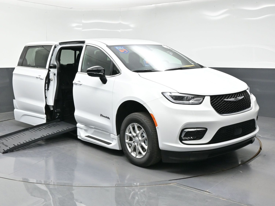 White Chrysler Pacifica with BraunAbility Side Entry Automatic Fold Out conversion