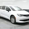 White Chrysler Voyager with BraunAbility Rear Entry Manual Fold Out conversion