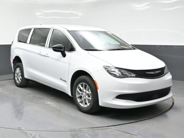 White Chrysler Voyager with BraunAbility Rear Entry Manual Fold Out conversion