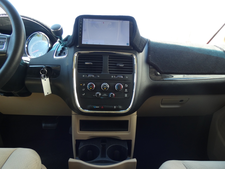 White Dodge Grand Caravan with Vantage Mobility Side Entry Automatic Fold Out conversion