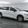 White Chrysler Voyager with BraunAbility Rear Entry Manual Fold Out conversion