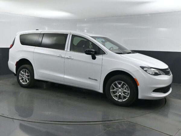 White Chrysler Voyager with BraunAbility Rear Entry Manual Fold Out conversion