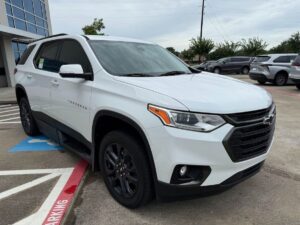 White Chevrolet Traverse with BraunAbility Side Entry Automatic In Floor conversion