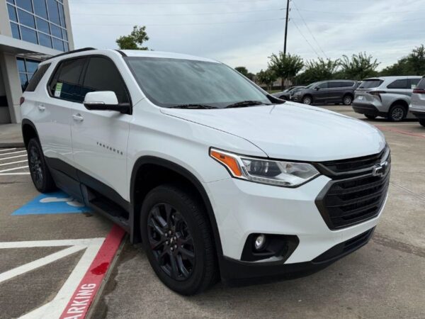 White Chevrolet Traverse with BraunAbility Side Entry Automatic In Floor conversion