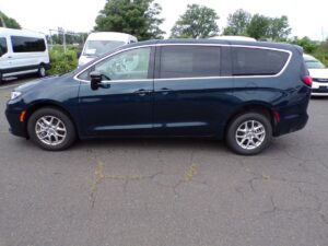 Blue Chrysler Pacifica with Driverge Rear Entry Manual Fold Out conversion