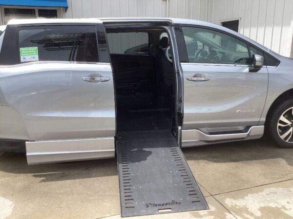 Silver Honda Odyssey with BraunAbility Side Entry Automatic In Floor conversion