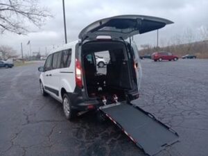 White Ford Transit Connect with Driverge Rear Entry Manual Fold Out conversion