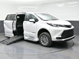 White Toyota Sienna with BraunAbility Side Entry Automatic Fold Out conversion