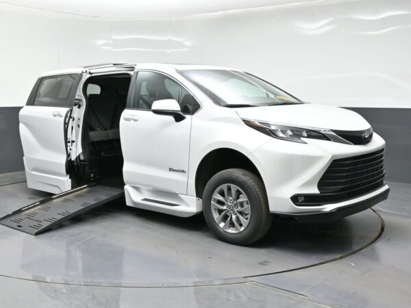 White Toyota Sienna with BraunAbility Side Entry Automatic Fold Out conversion