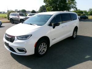 White Chrysler Pacifica with BraunAbility Rear Entry Manual Fold Out conversion