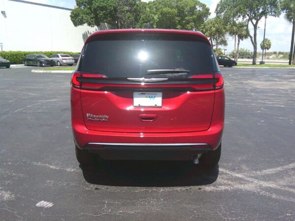 Red Chrysler Pacifica with BraunAbility Side Entry Automatic Fold Out conversion