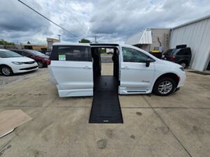 White Chrysler Pacifica with BraunAbility Side Entry Automatic Fold Out conversion