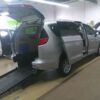 Silver Chrysler Voyager with BraunAbility Rear Entry Manual Fold Out conversion