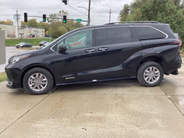 Black Toyota Sienna with Driverge Rear Entry Manual Fold Out conversion