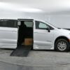 White Chrysler Pacifica with BraunAbility Side Entry Automatic Fold Out conversion