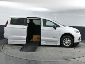 White Chrysler Pacifica with BraunAbility Side Entry Automatic Fold Out conversion