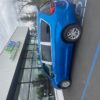 Blue Chrysler Pacifica with Driverge Side Entry Automatic Fold Out conversion