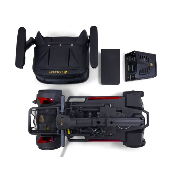 Overhead view of a disassembled Buzzaround CarryOn HD 4-Wheel Scooter displaying the seat, battery, battery case, and base frame on a white background.