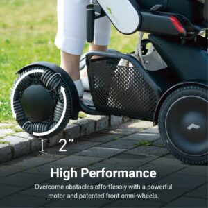 Using the WHILL Model C2 High Back mobility device, which features omni-wheels, a user climbs a 2-inch curb—demonstrating the product’s capability to surmount small obstacles.