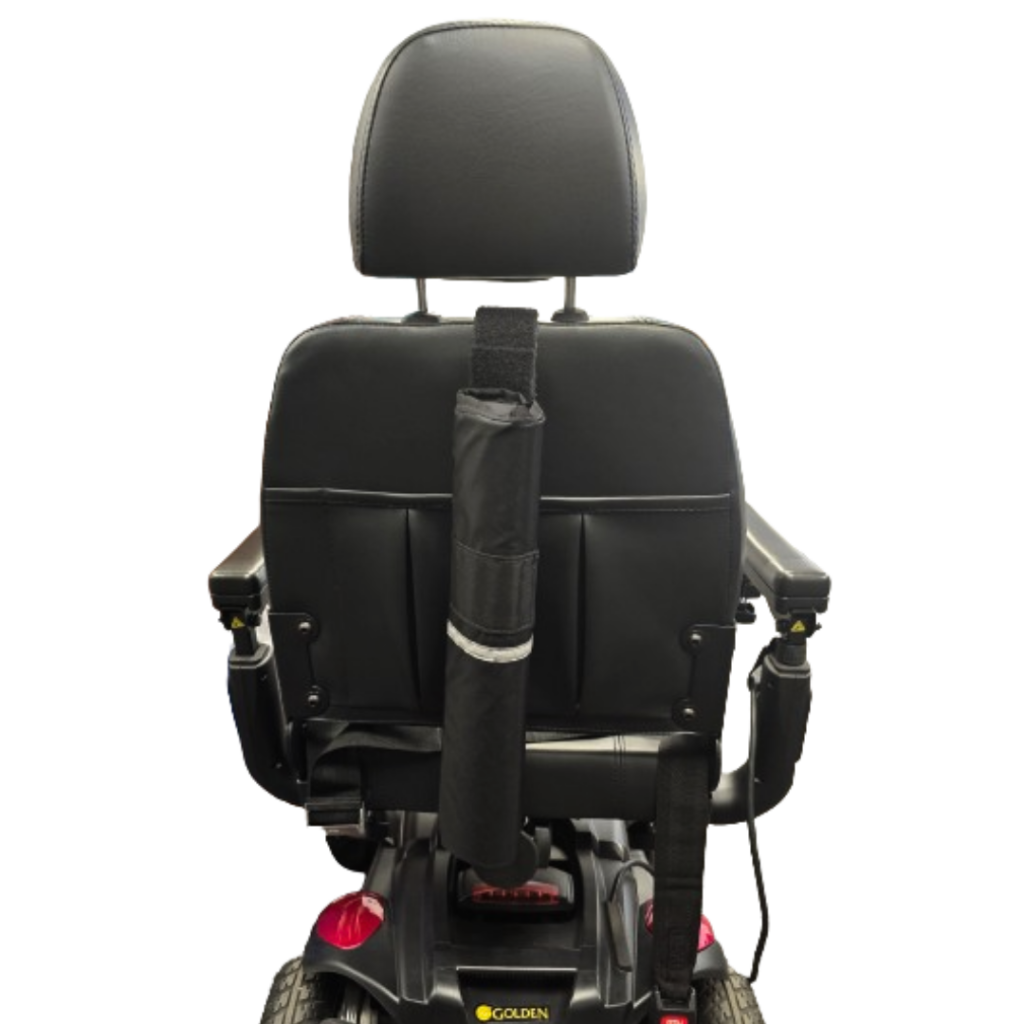 Golden Tech Tube Cane Holder viewed from behind, showing a sleek black seat with armrests and a cylindrical storage bag attached.