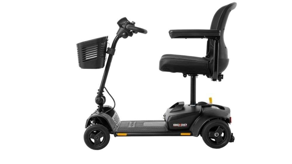 A side view of a Go Go™ Elite Traveller® 2 4-Wheel Scooter in black, featuring a front basket, armrests, and a padded seat, set against a white background.