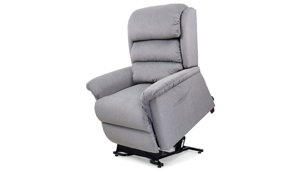 The Relaxer Lift Chair, upholstered in light grey, is shown in a partially raised reclined position against a white background.