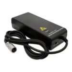 The Battery Charger for Baja Raptor 2 (8A) is black, features a cooling vent, power switch, and attached cable with a metal connector, shown on a white background.