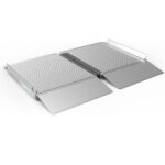 The SUITCASE Singlefold Portable Aluminum Wheelchair Ramp (OPEN BOX) features a ridged surface and side guard, providing accessible passage over steps or raised landings.