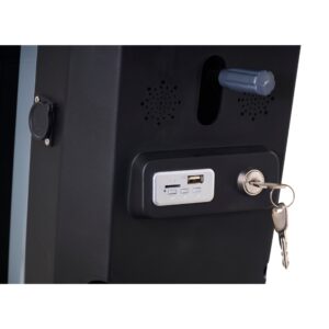 Close-up of the Eagle All-Terrain Scooter’s black electronic control unit, showing a USB port, control buttons, ventilation holes, a handle, and a lock with two keys on the key ring.