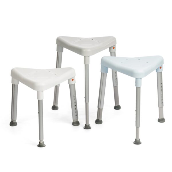 Three Etac Edge Shower Stools, each with grey metal legs and rubber tips, are arranged side by side on a white background.