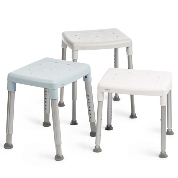 Three Etac Smart Shower Stools with square seats in white and light blue, each featuring an adjustable height, four metal legs, and non-slip rubber feet.