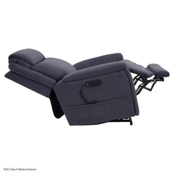 A dark gray Evolution Lift Chair with an extended footrest and reclined backrest, shown from the side against a white background.