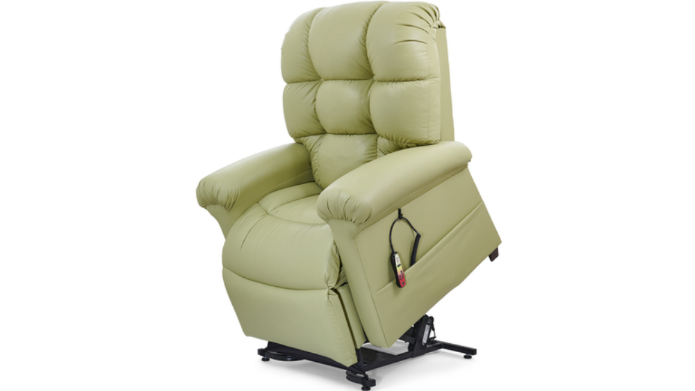 Cloud Lift Chair w/ MaxiComfort in light green upholstery, featuring a padded backrest and armrests, elevated on a black metal base with a wired remote attached to the right side.