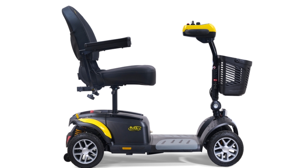 BuzzAround EX 4-Wheel Scooter featuring armrests, a high-back seat, four wheels, a front basket, and stylish black-and-yellow accents, shown in side profile on a white background.