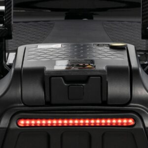 Close-up view of a black electric scooter deck with a textured surface, Lithium Battery for Go Go Carbon compartment, and a horizontal red LED light strip.