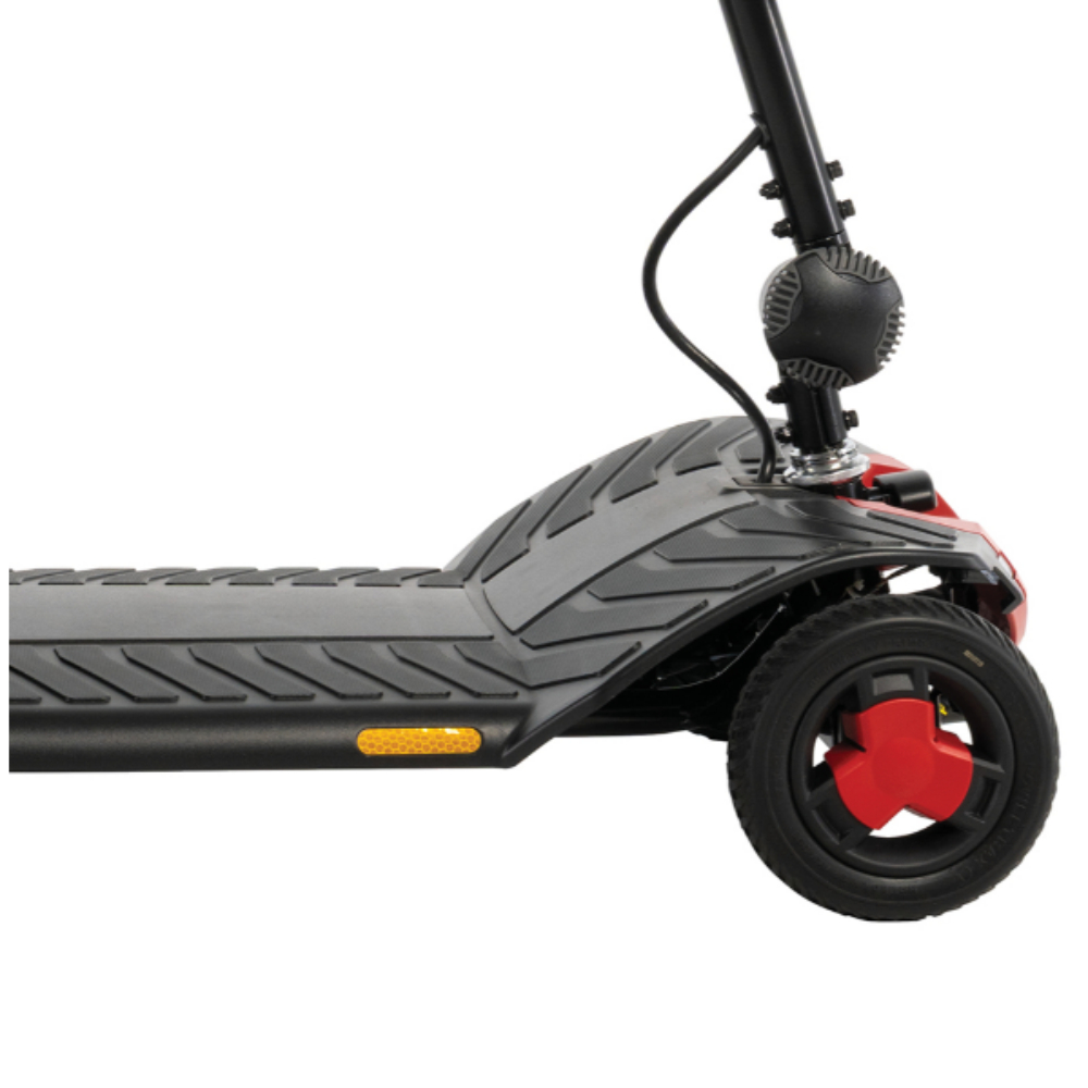 Close-up of the front section of a black Go Go Elite Traveller Gen 3 electric scooter, showing the deck, handlebar stem, front wheel, and a yellow reflector.